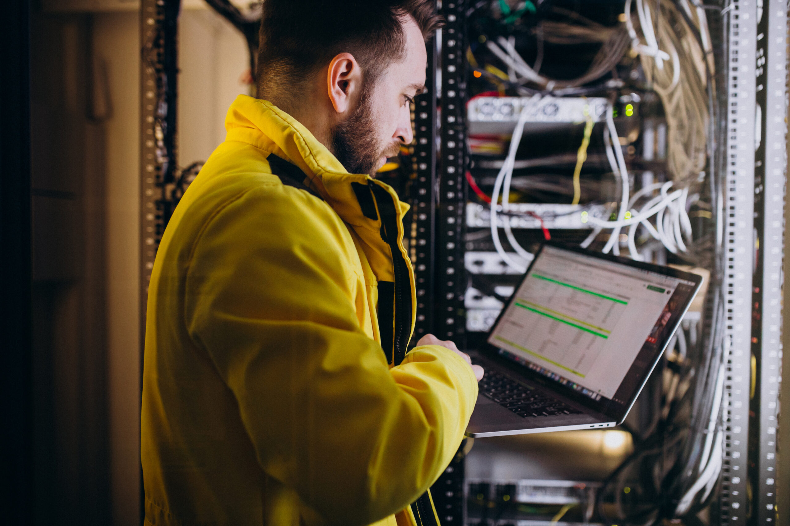 Principal young man engineer making program analyses
